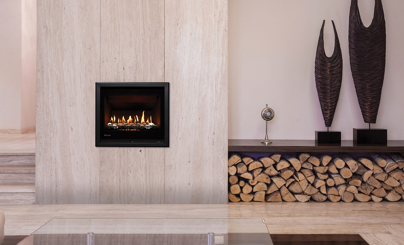 Rinnai 650 Gas Fireplace (lifestyle - stone wall)