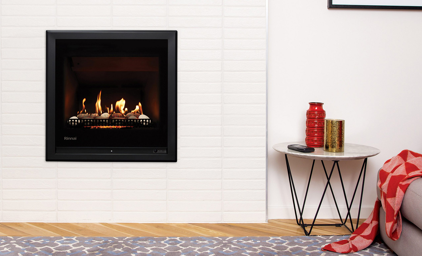 Rinnai 650 Gas Fireplace (lifestyle - stones wall white)