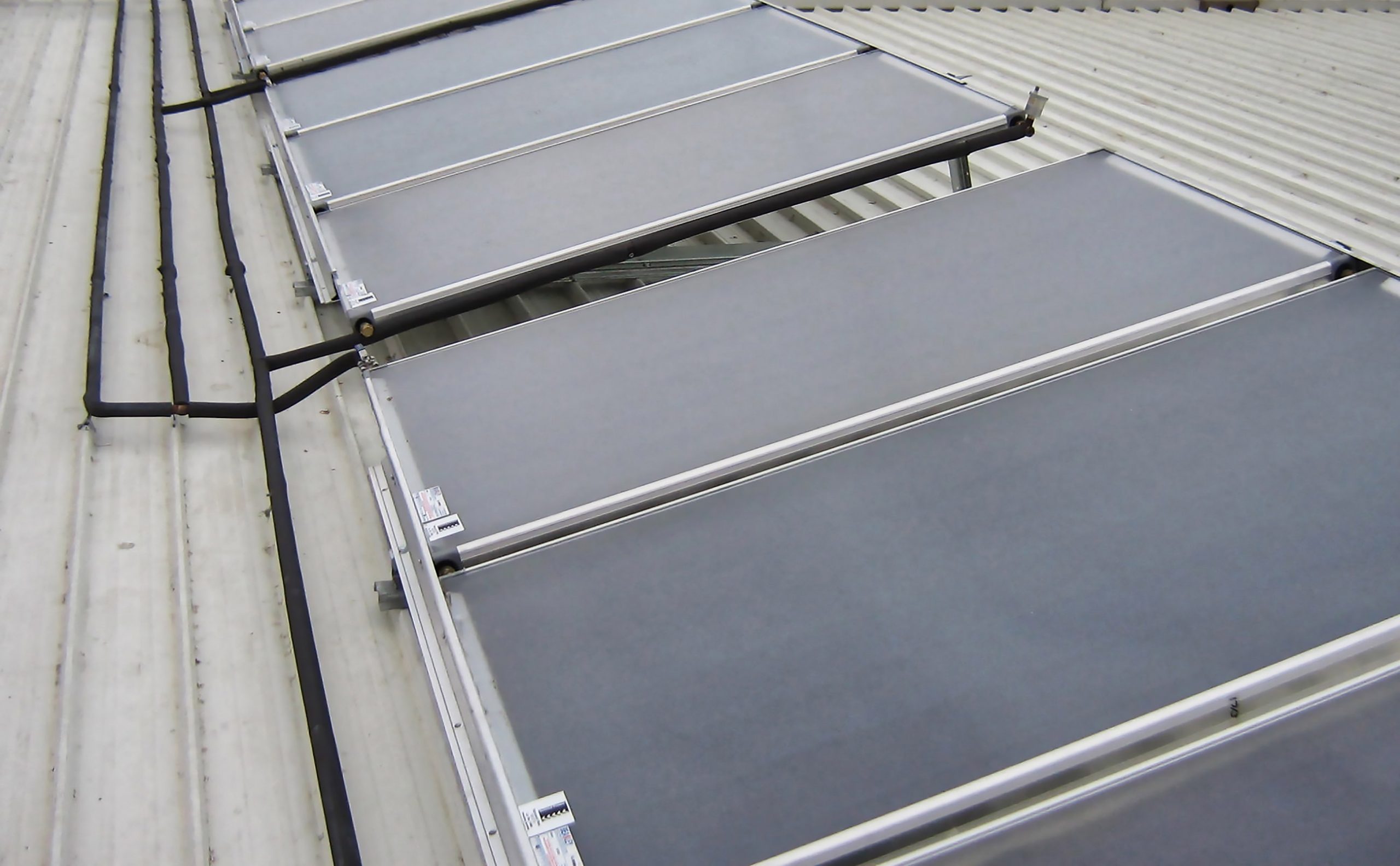 Rinnai Commercial Solar Pre-heat Flat Plate System (rooftop - right)